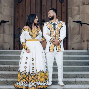 Beautiful Habesha Couples Outfit: Elegant Yellow Design in Traditional Habesha Couples Wedding Outfit